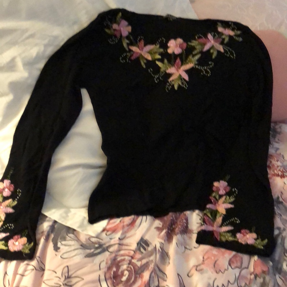 Black top with flowers.